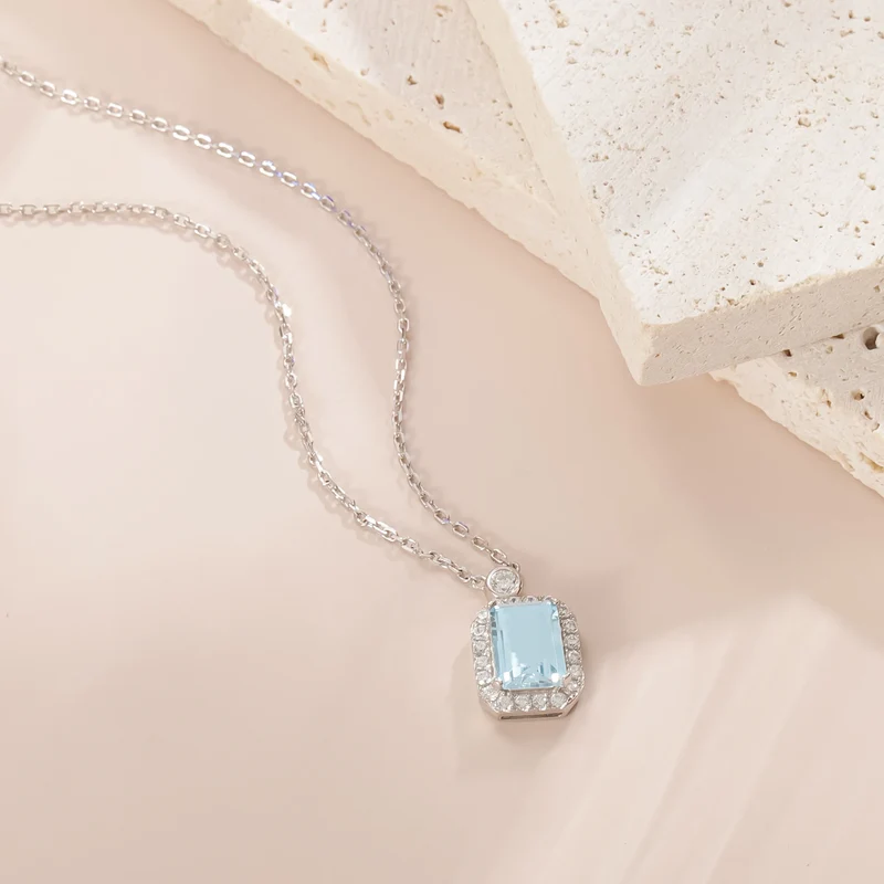 Birthstone topaz necklace with a natural sky blue topaz and clear diamond cz stones silver pendant necklace