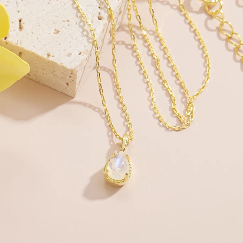 Moonstone crystal necklace in a teardrop shape dainty gold necklace