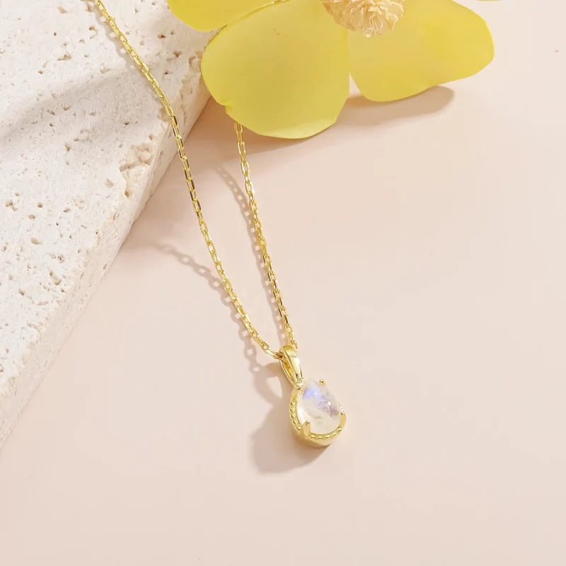 Moonstone crystal necklace in a teardrop shape dainty gold necklace