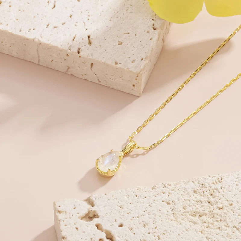 Moonstone crystal necklace in a teardrop shape dainty gold necklace