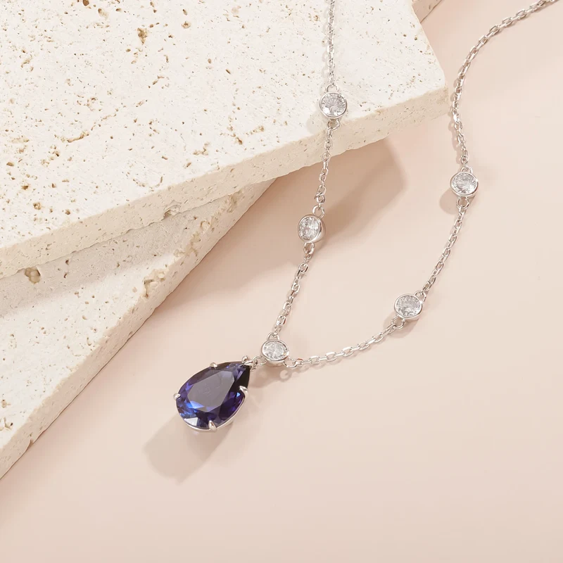Silver sapphire necklace with a lab-created blue sapphire stone pendant necklace
