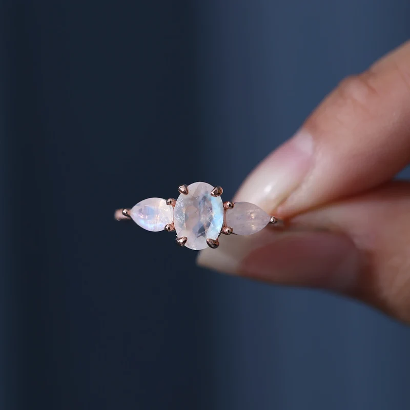 Three-stone ring with natural moonstones art deco