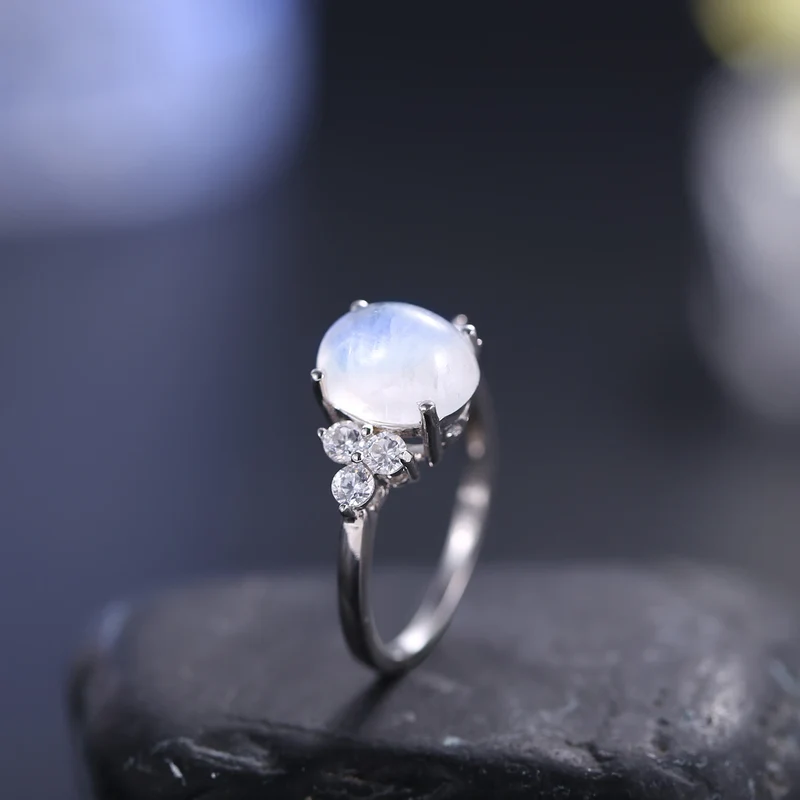 Silver moonstone ring with an oval moonstone and clear diamond cz