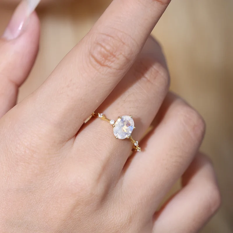 Moonstone promise ring with a think band stacking ring