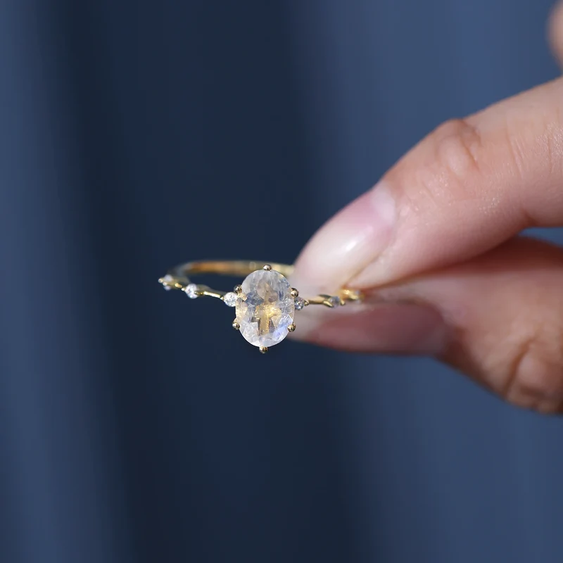 Moonstone promise ring with a think band stacking ring