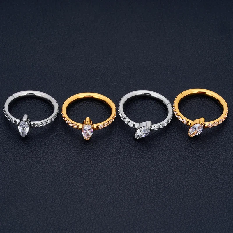 Snug piercing ring 16G titanium with marquise CZ stones hinged segment clicker