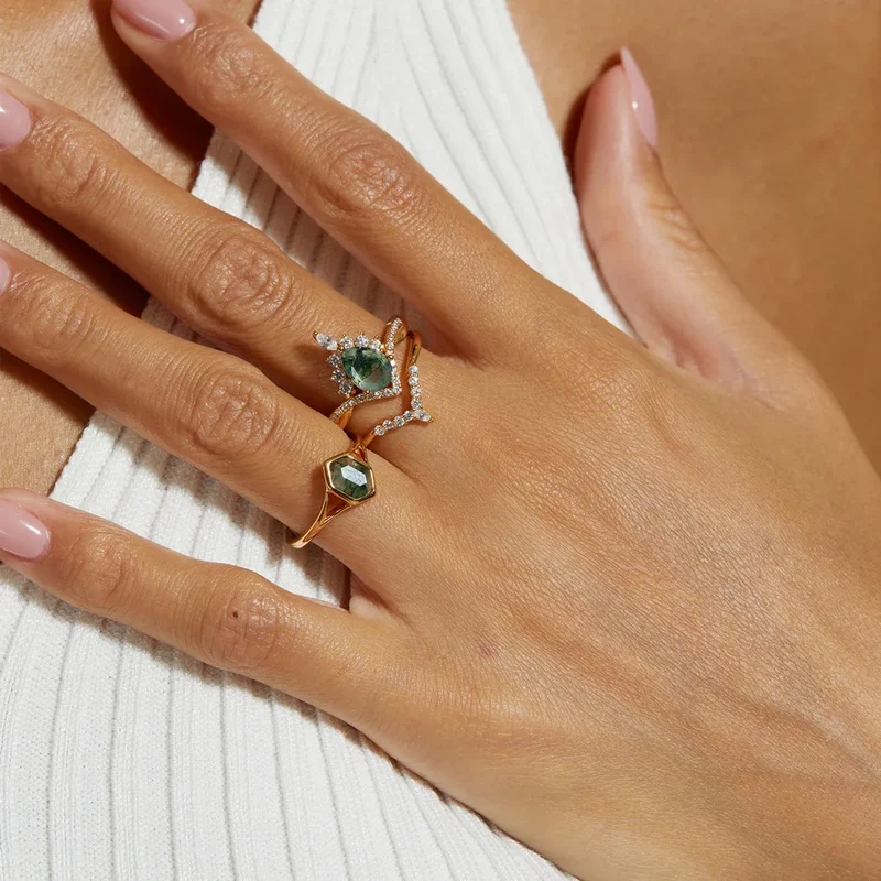 Moss agate wedding ring set with a pear-shaped moss agate sterling silver