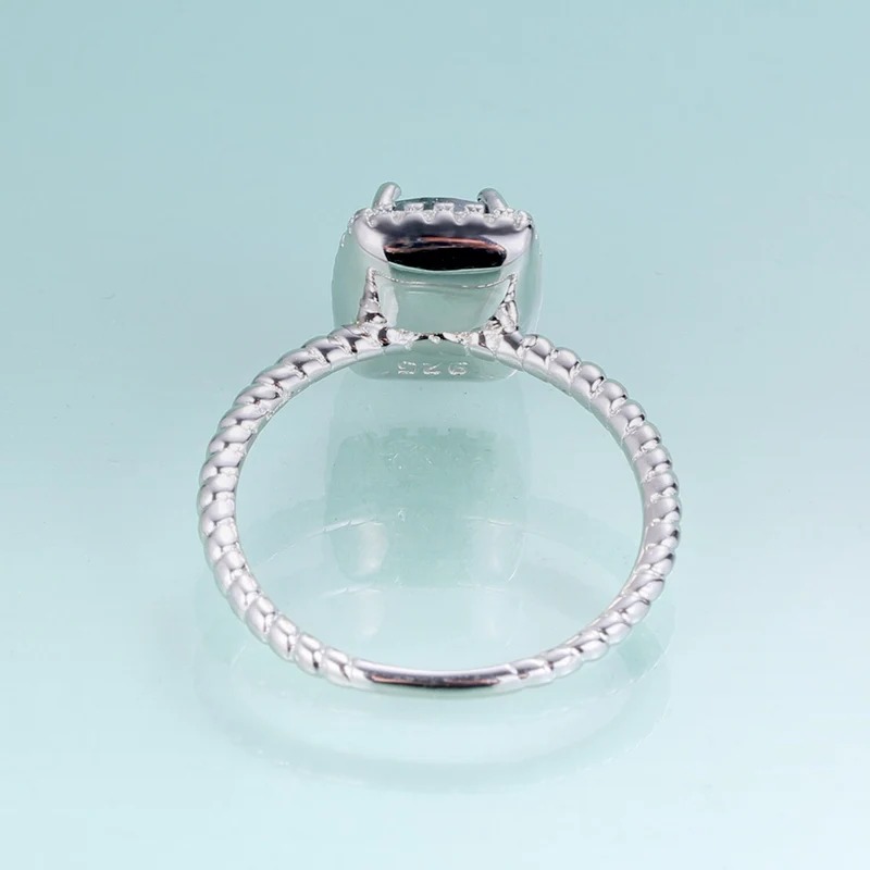 Moss agate engagement ring in silver halo ring rectangle shaped