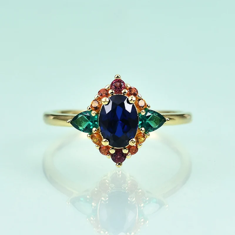 Blue sapphire ring with emerald art deco vintage style colorful ring