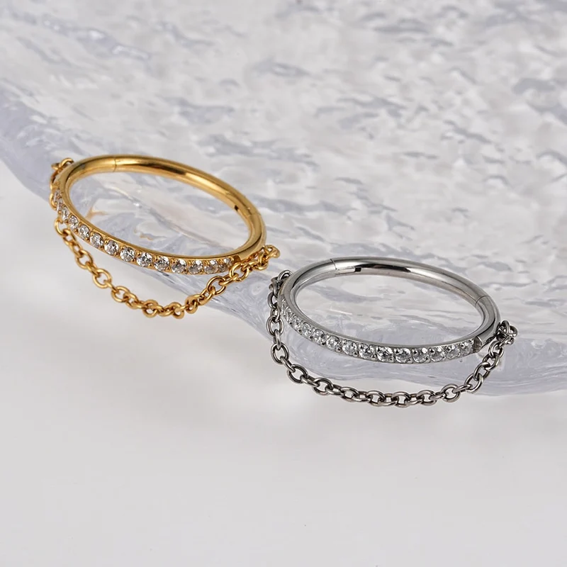 Gold helix hoop with a chain and CZ titanium 16G