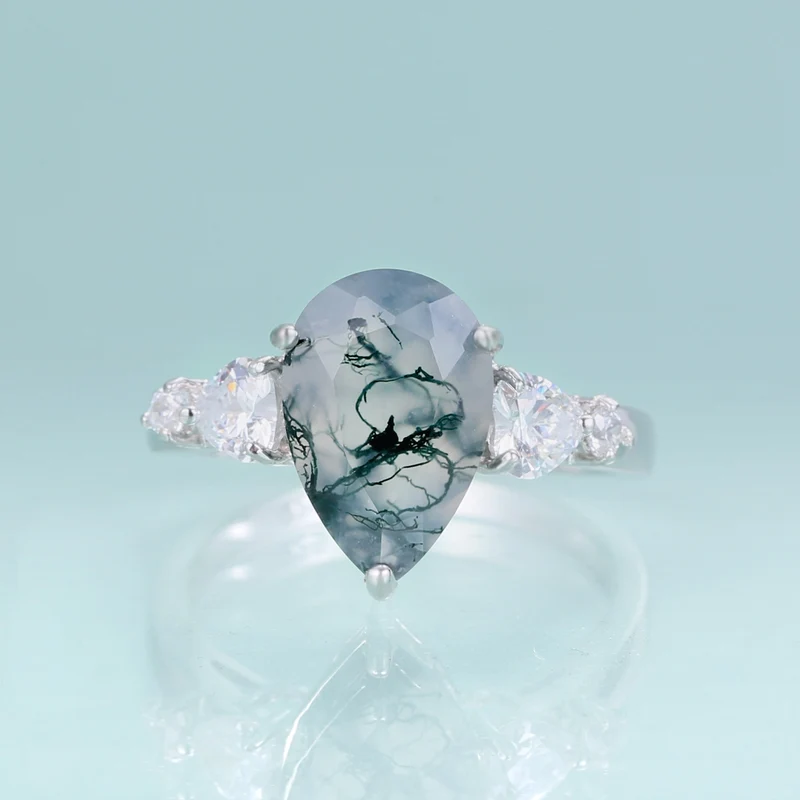 Moss agate pear-shaped ring in silver