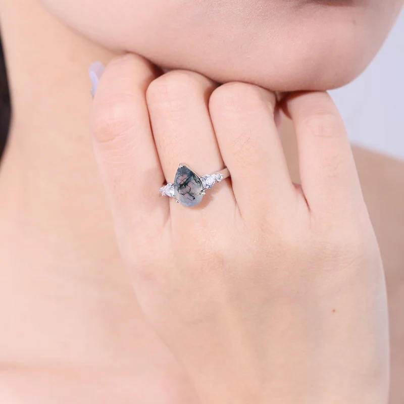 Moss agate pear-shaped ring in silver