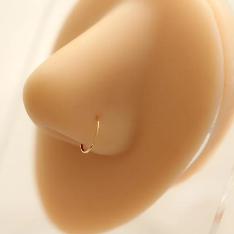 14K gold nose ring simple and minimalist