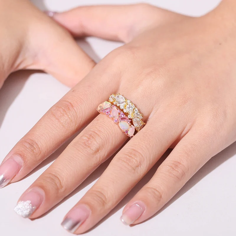 Ethiopian opal ring with pink sapphire semi-eternity ethiopian opal engagement ring
