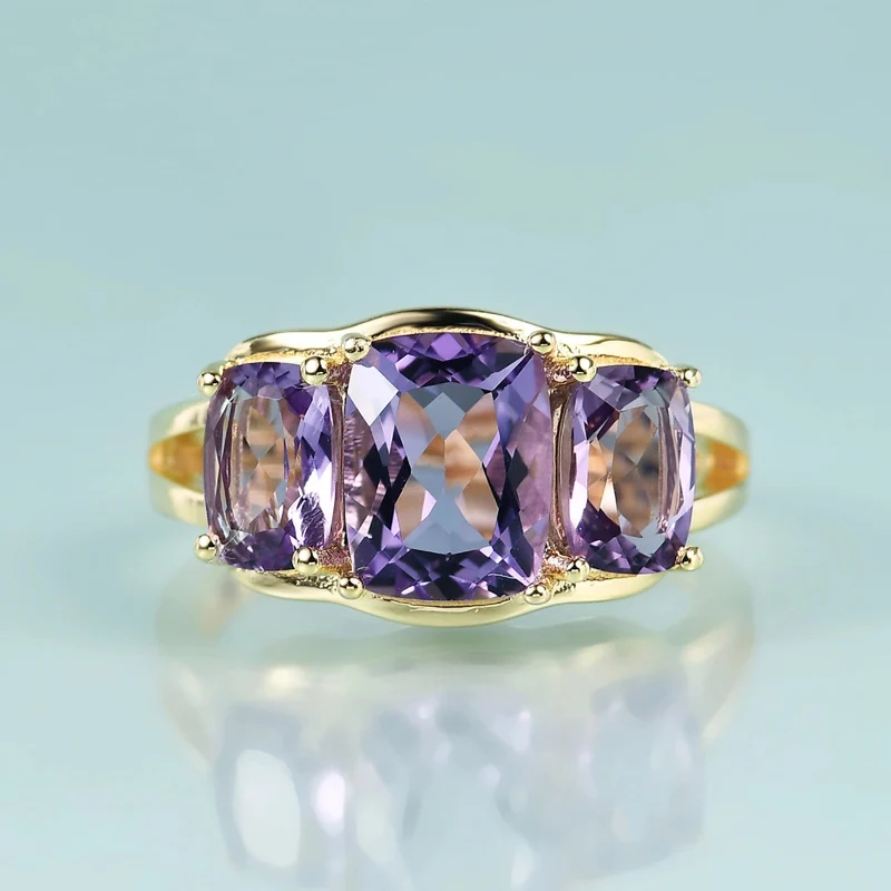 Three-stone trellis amethyst ring