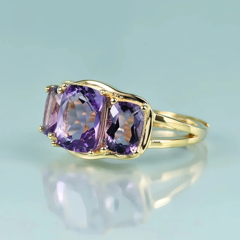 Three-stone trellis amethyst ring