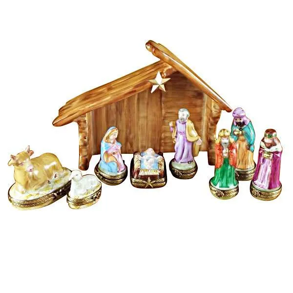 Eight Piece Mini Hinged Limoges Nativity with Porcelain Stable