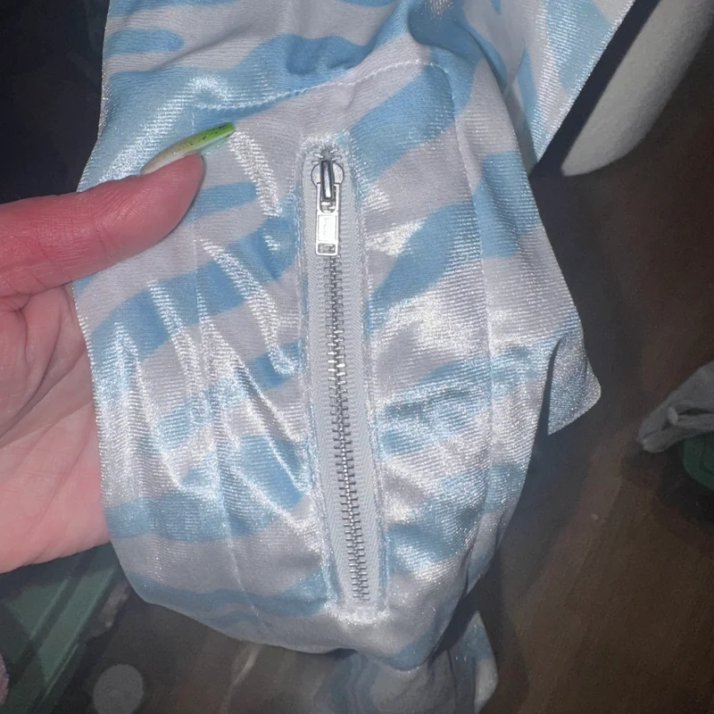 Icy zebra zip up crop top