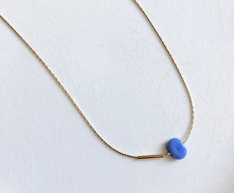 Collier Bim doré et verre opaque bleu